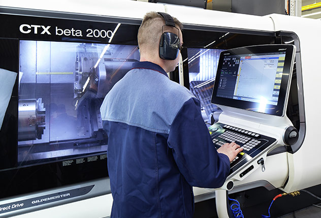 Production process on a CNC lathe machine at Kulina factory